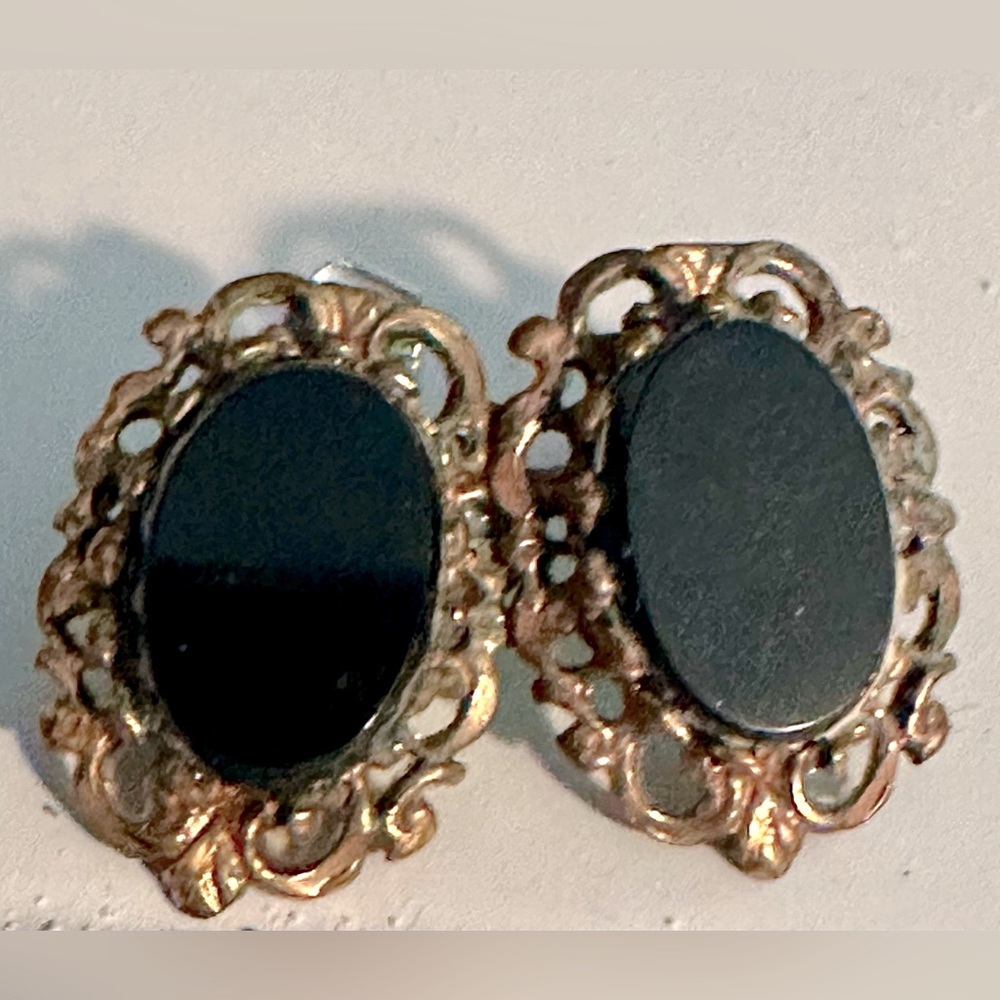 Black oval ornate earrings